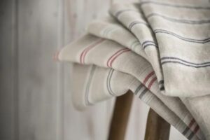 Does linen shrink in the dryer